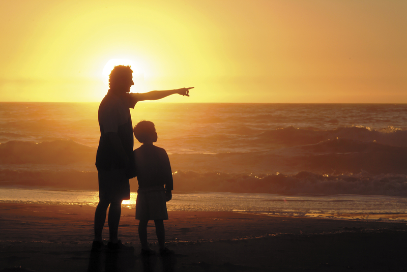 A man pointing in the distance signifying a financial broker offering different services then your bank